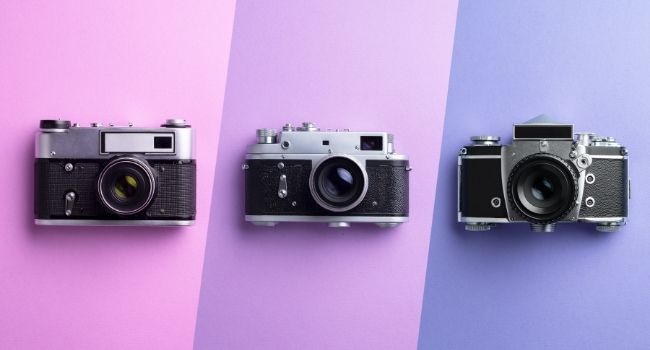 Image of three SLR cameras