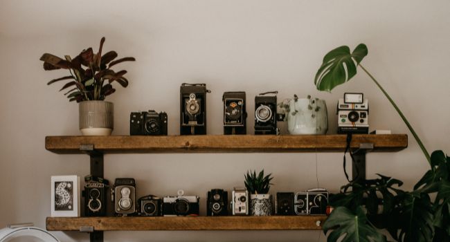 image of some vintage camera on home shelf