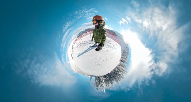 image of a snowboarder taken with 360 camera