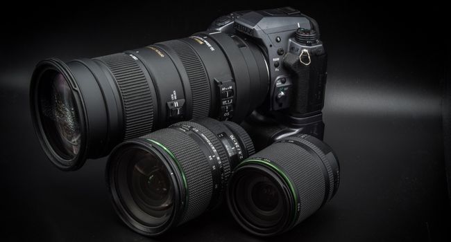 image of Pentax camera with three lenses