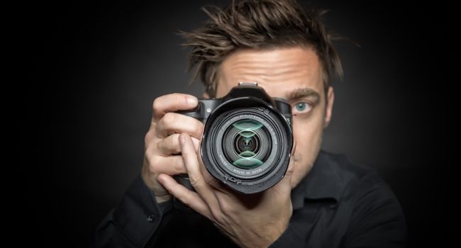 image of a guy behind a camera