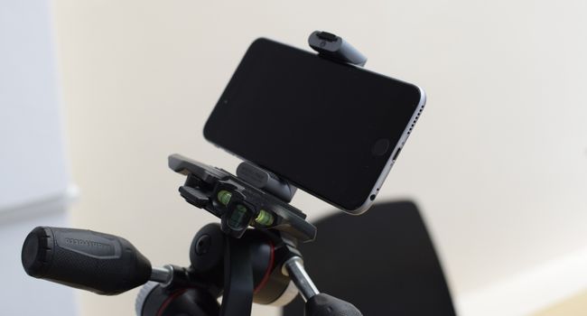 mobile phone connected on tripod