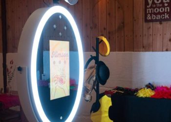 magic mirror booth with LED and props on the right